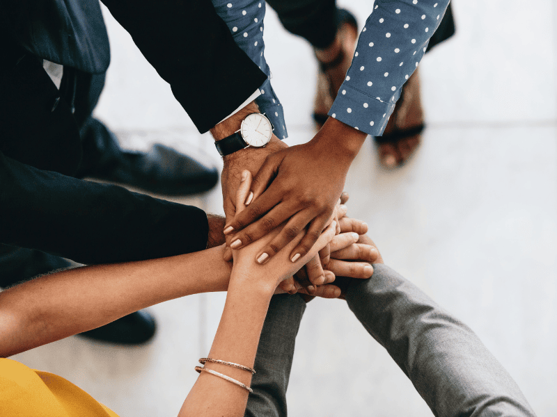 Close-up of a hand pointing at a route map and data on a tablet, symbolizing administrative support and crew route optimization for efficiency