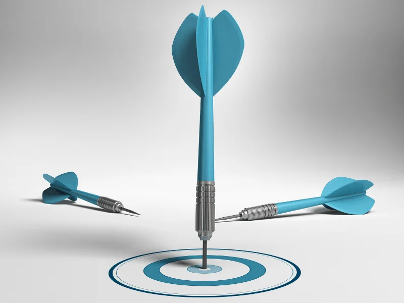 Blue dart hitting the center of a bullseye target, representing the perfect match for the Smart Claims Elite Performance Package and business success