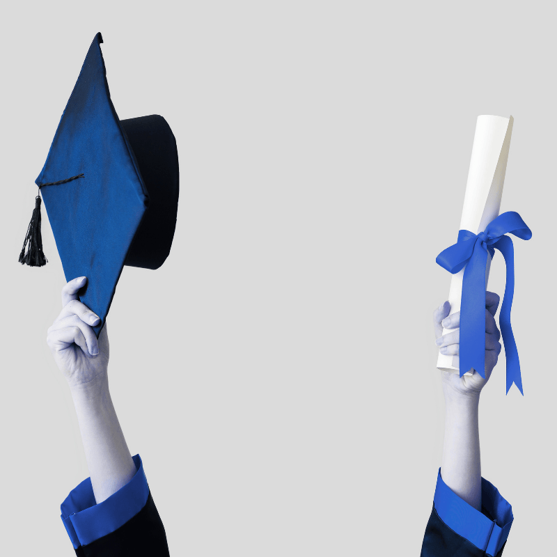 Hands raising a blue graduation cap and a diploma, symbolizing professional business mastery and training at Smart Claims University for restoration contractors